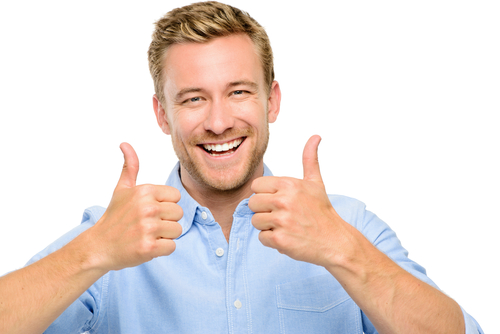 happy man giving two thumbs up after straightening teeth with Dalton adult braces