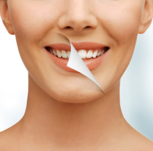 graphic of page turning revealing whiter teeth from Dalton treatment