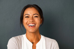 woman laughing showing smile